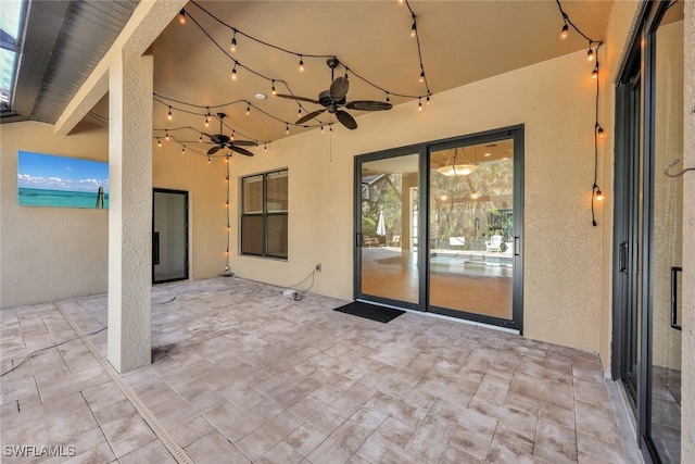 view of patio with ceiling fan