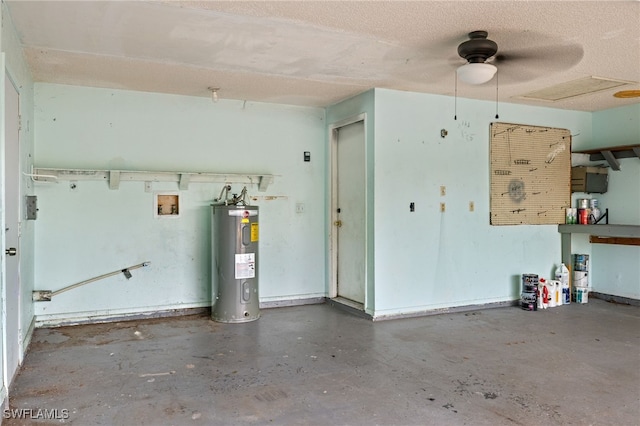 garage with a workshop area, ceiling fan, and water heater