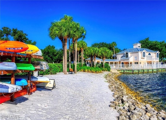 view of property's community featuring a water view