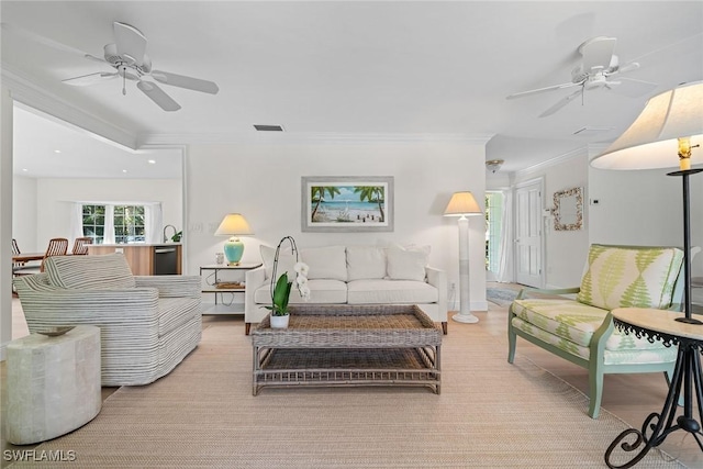 living room featuring ornamental molding