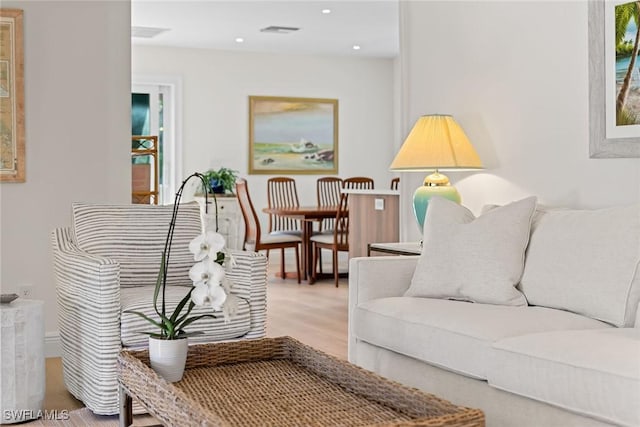 living room with hardwood / wood-style floors