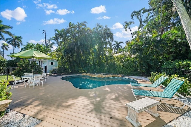 view of pool featuring a wooden deck