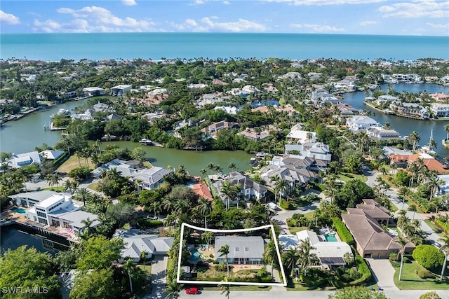 bird's eye view with a water view