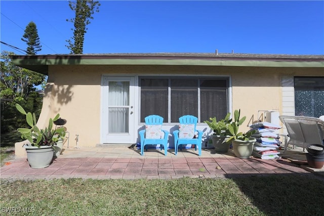 rear view of property with a patio area