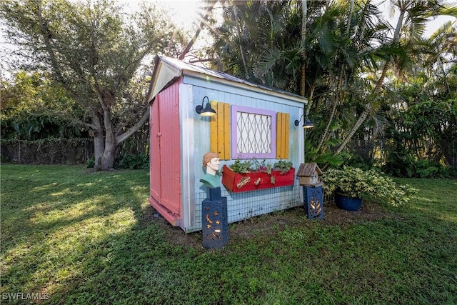 view of outdoor structure with a yard