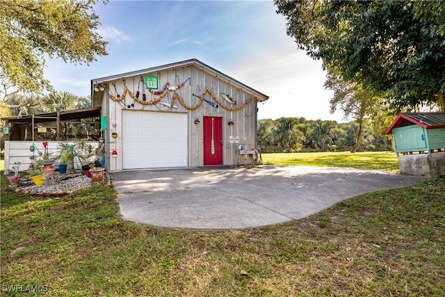 garage with a yard