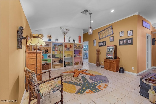 sitting room featuring light tile patterned floors, vaulted ceiling, and ornamental molding