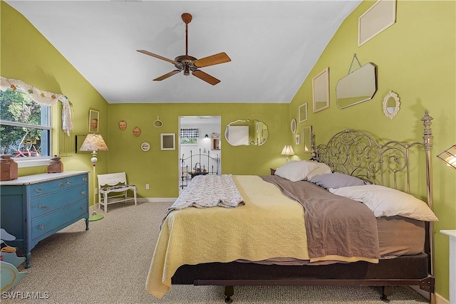 carpeted bedroom featuring ceiling fan and lofted ceiling