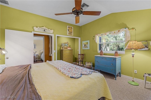 bedroom with carpet, ceiling fan, and lofted ceiling