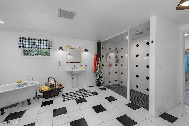 bathroom with tile patterned floors and plus walk in shower