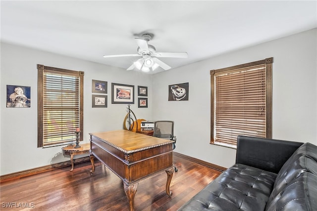 office area featuring ceiling fan and dark hardwood / wood-style flooring