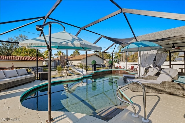 view of pool featuring a patio and a lanai