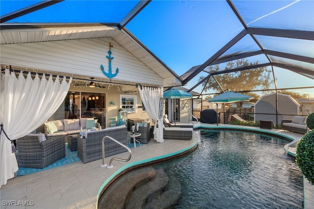 view of pool featuring an outdoor living space, a lanai, and a patio area