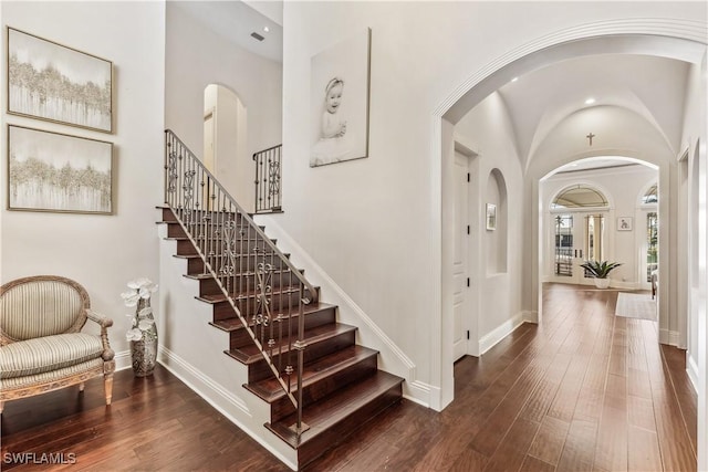 foyer with dark wood-type flooring