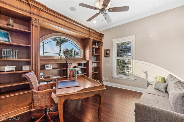 office with dark hardwood / wood-style floors, ceiling fan, and crown molding