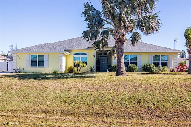 ranch-style house with a front yard