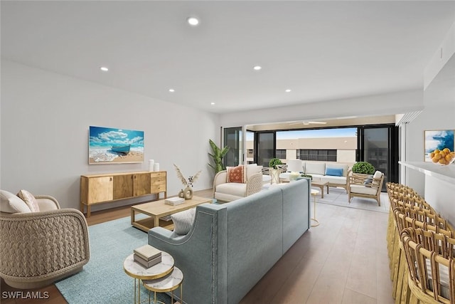 living room with light hardwood / wood-style flooring