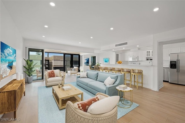 living room featuring light hardwood / wood-style floors