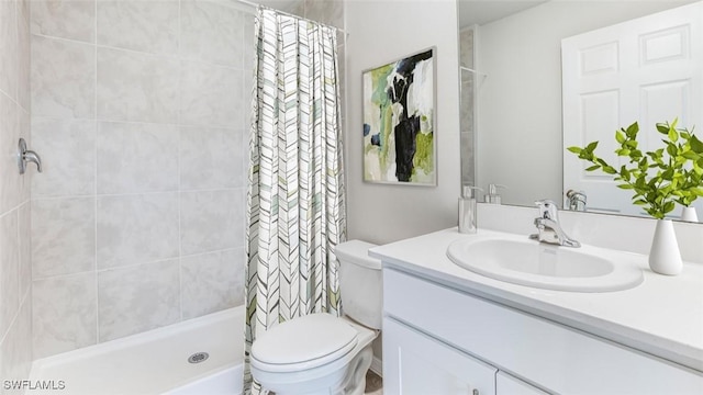 bathroom with walk in shower, vanity, and toilet