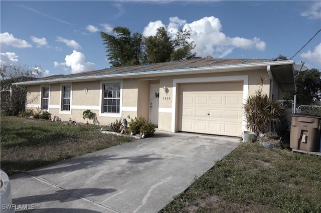 ranch-style home with a garage