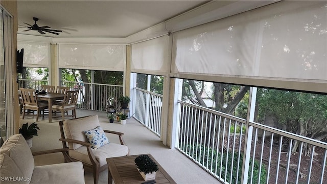 sunroom / solarium with ceiling fan