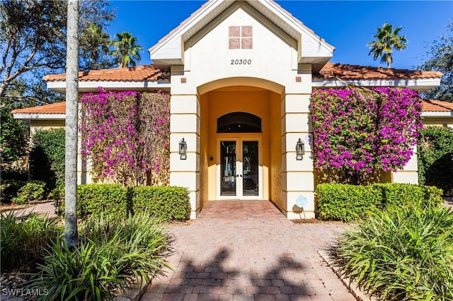 doorway to property with french doors