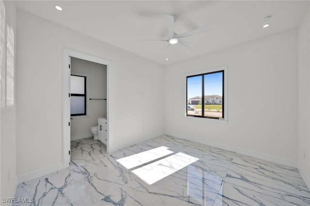 unfurnished room with ceiling fan