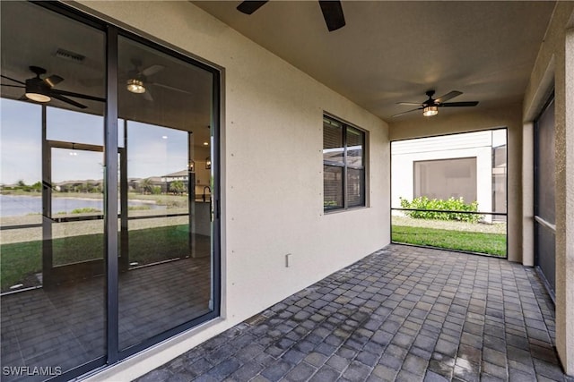 unfurnished sunroom featuring a wealth of natural light