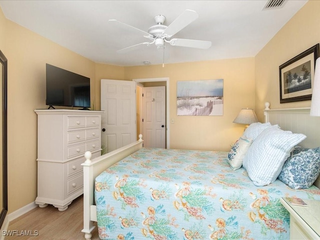 bedroom featuring ceiling fan and light hardwood / wood-style floors