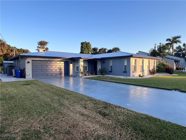 single story home featuring a front yard and a garage