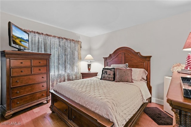 bedroom featuring light hardwood / wood-style flooring