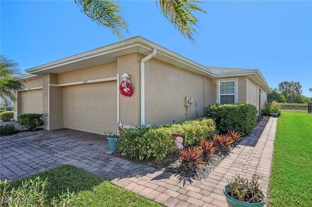 view of property exterior featuring a garage