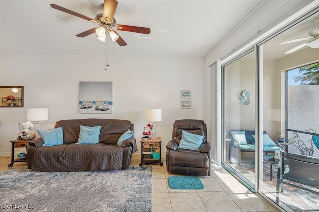 tiled living room featuring ceiling fan