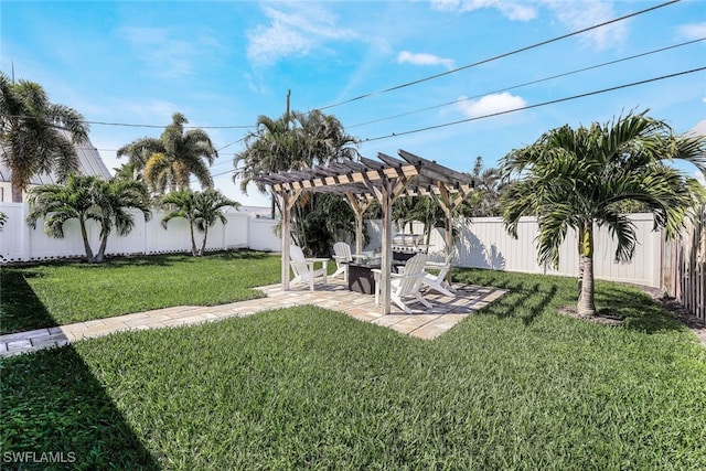 view of yard featuring a patio area and a pergola