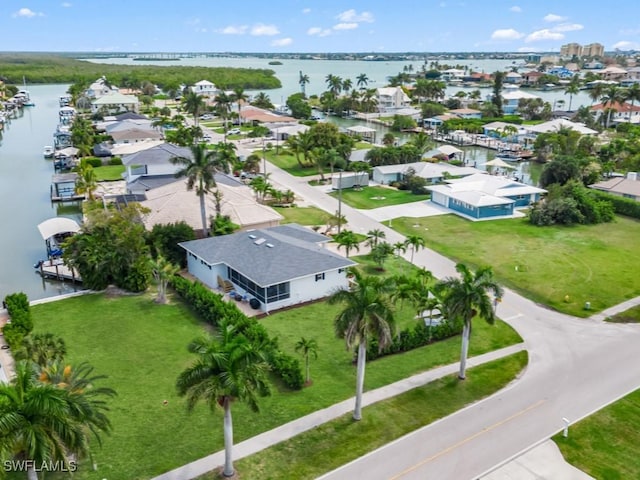 drone / aerial view featuring a water view