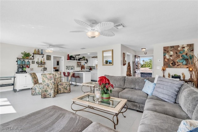 living room featuring ceiling fan