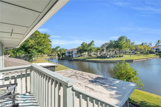 balcony featuring a water view