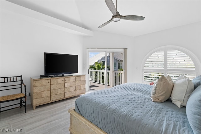 bedroom with ceiling fan, light hardwood / wood-style floors, multiple windows, and access to outside