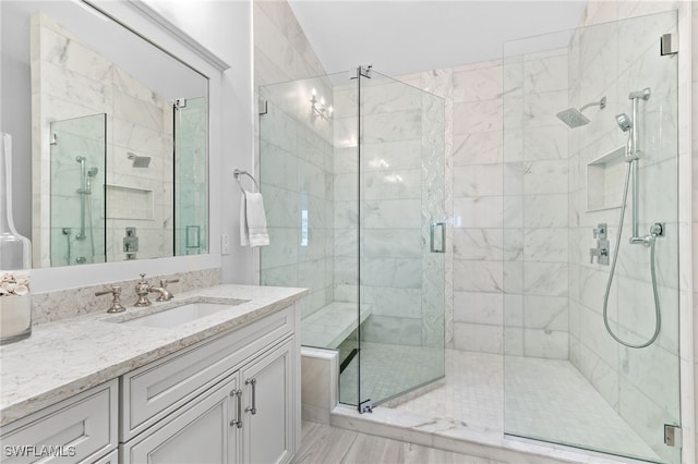 160 Barefoot Cir Unit 38, Bonita Springs, FL 34134 - bathroom with vanity and a stall shower