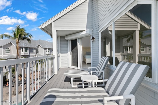 160 Barefoot Cir Unit 38, Bonita Springs, FL 34134 - wooden deck featuring a residential view