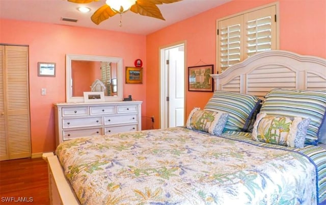 bedroom featuring a closet, ceiling fan, and hardwood / wood-style floors