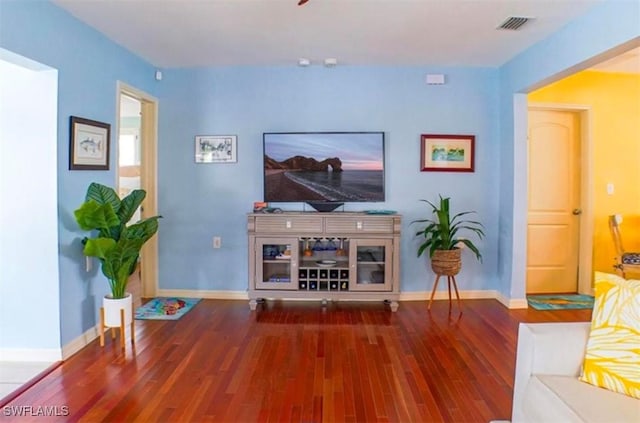 living room with hardwood / wood-style flooring