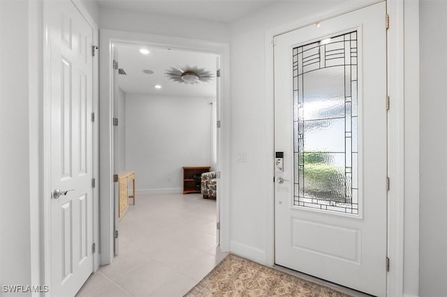 entryway featuring light tile patterned flooring