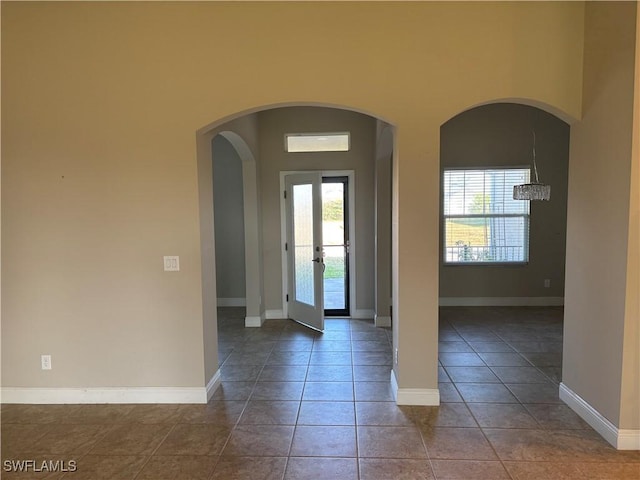 tiled foyer entrance with french doors