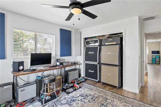 office featuring ceiling fan and dark wood-type flooring