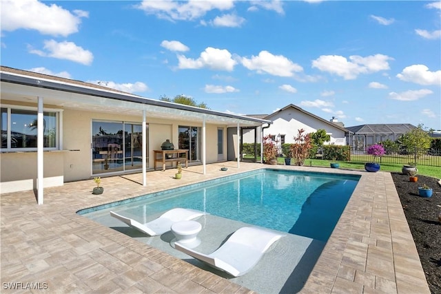 view of pool with a patio