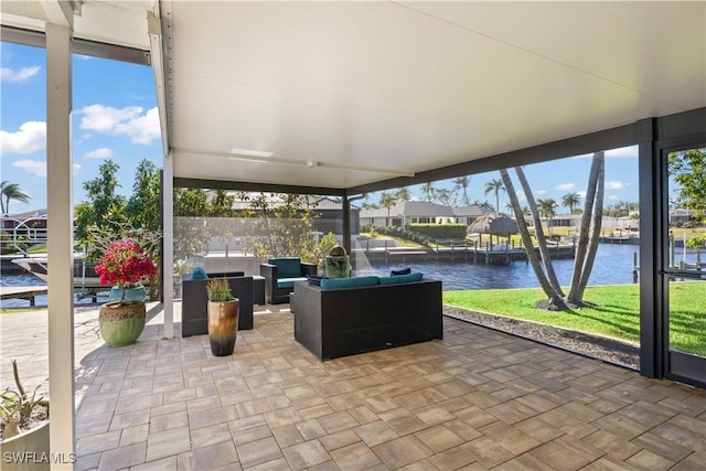 view of patio featuring an outdoor living space and a water view