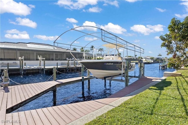 view of dock featuring a yard and a water view