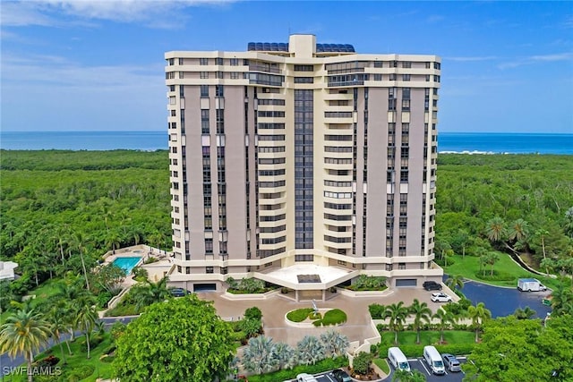 view of building exterior with a water view