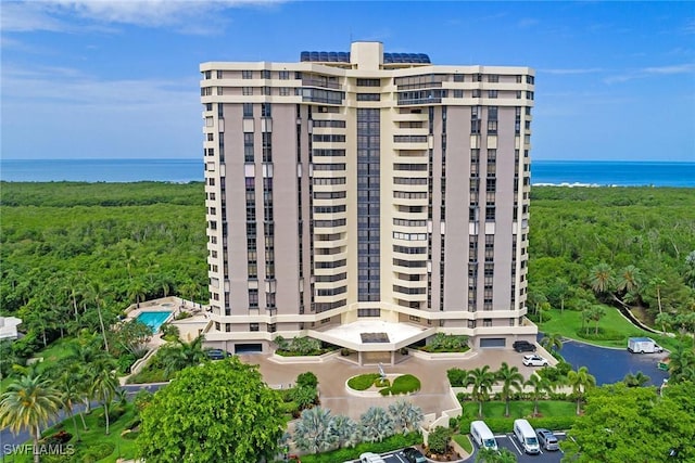6001 Pelican Bay Blvd Unit 204, Naples, FL 34108 - view of apartment building / complex with a water view